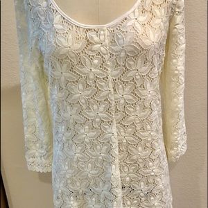 Lace long sleeve white peekaboo dress.
